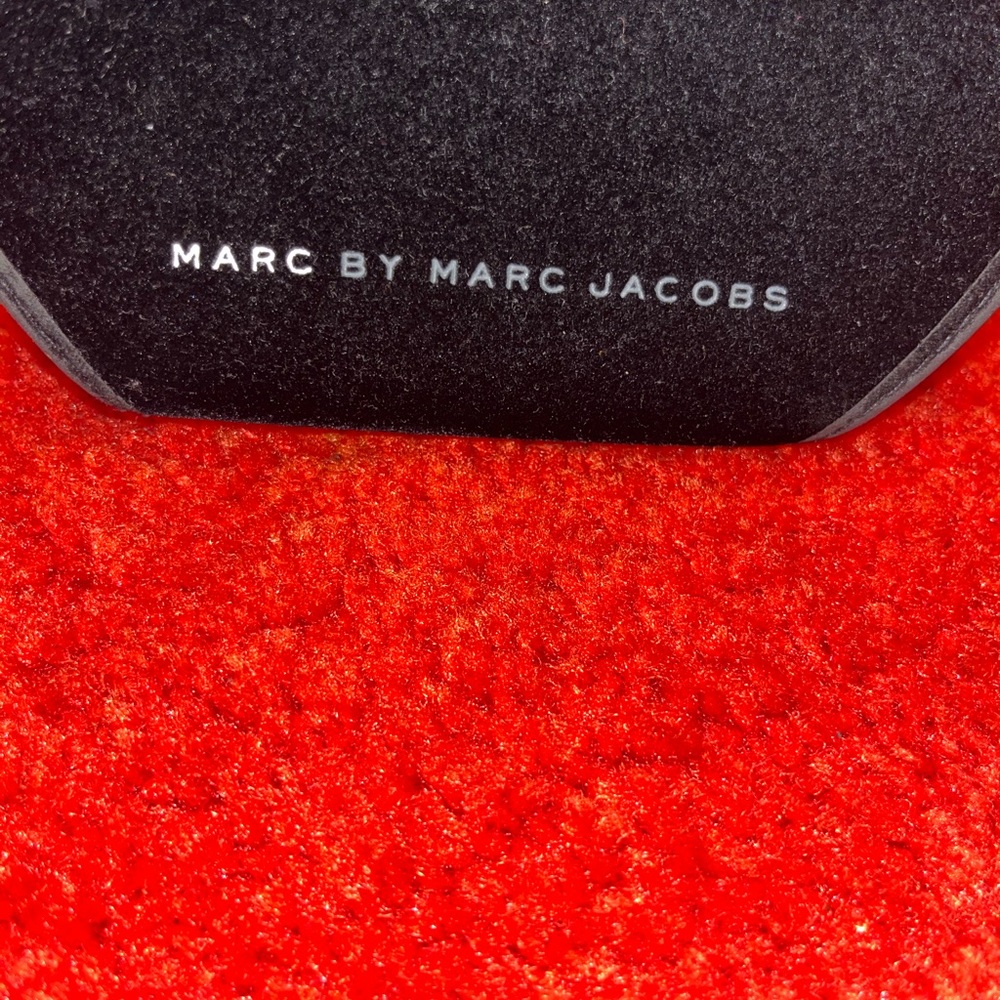 Marc By Marc Jacobs Red sunglasses with black tint.